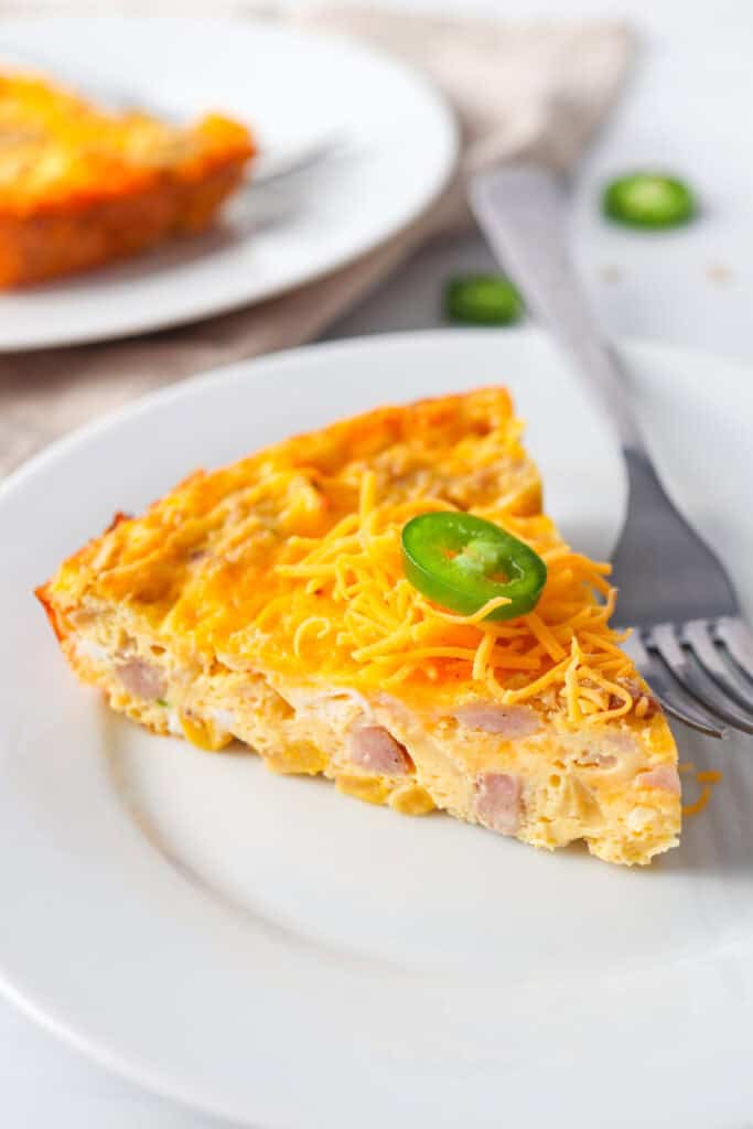 Freshly baked jalapeño cheddar frittata in a dish.