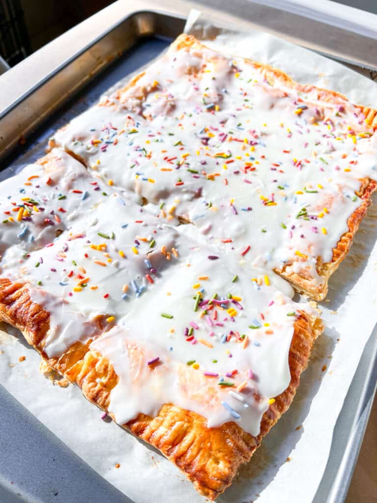 Giant Strawberry Pop Tart with icing and sprinkles