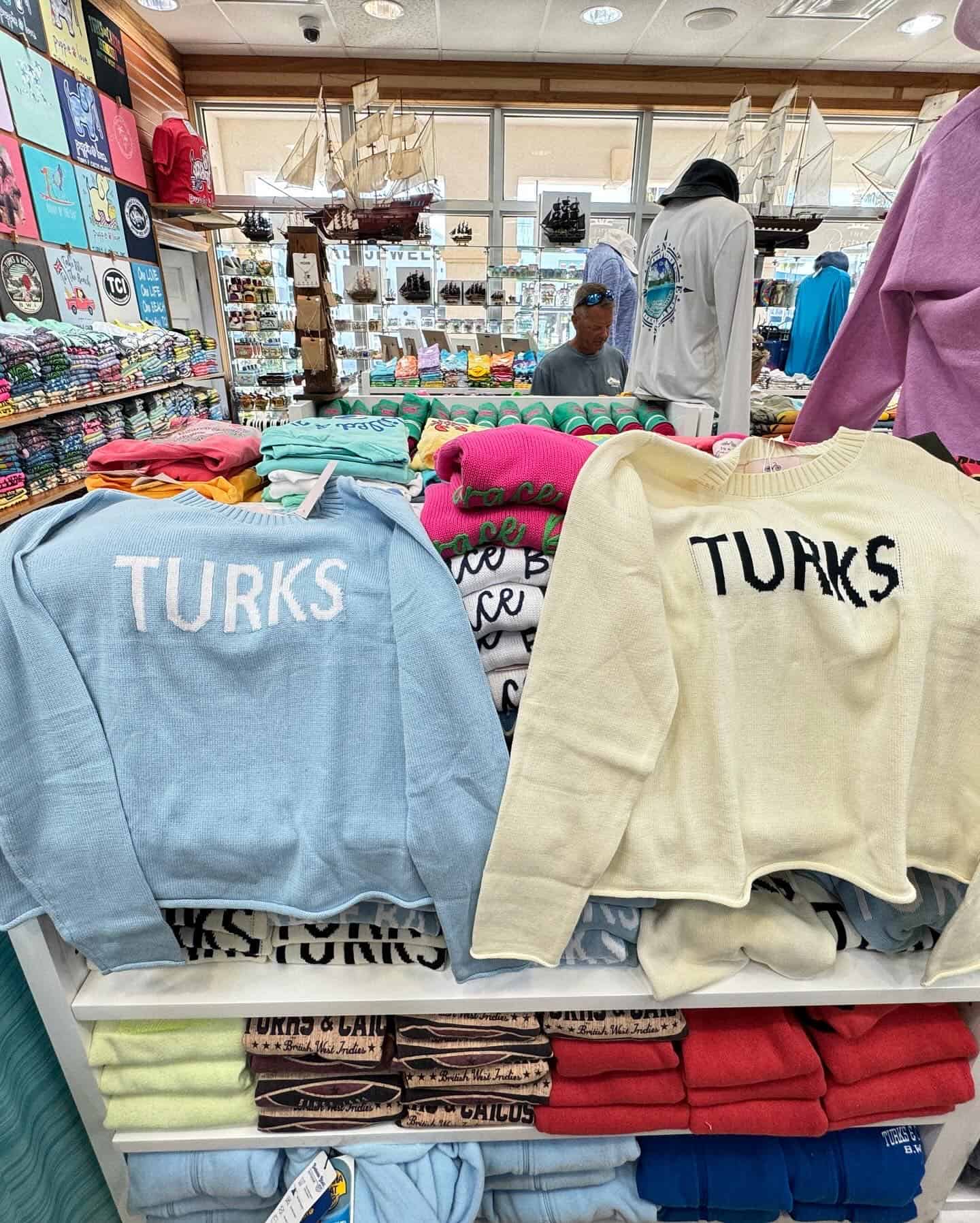 blue and white turks and caicos sweaters at gift shop